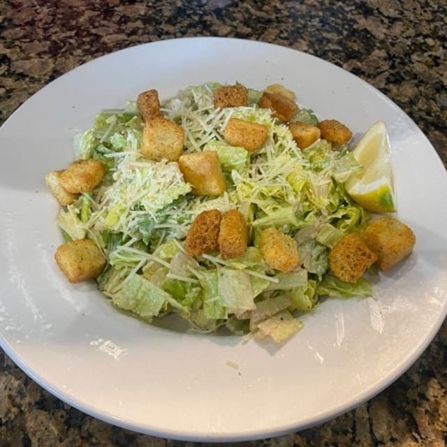 Greg's Signature Caesar Salad.